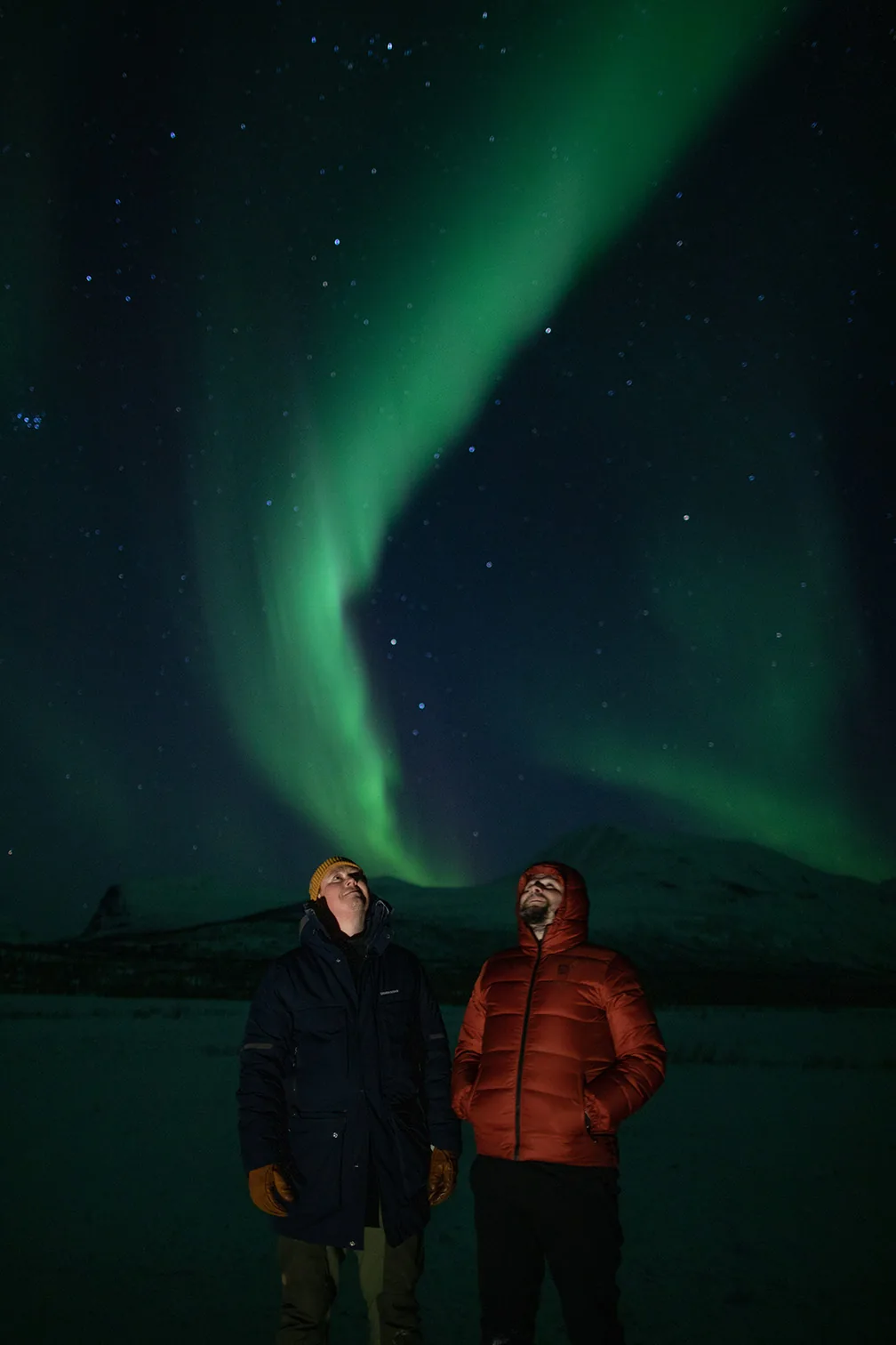 Our guides watching the northern lights outside Kiruna