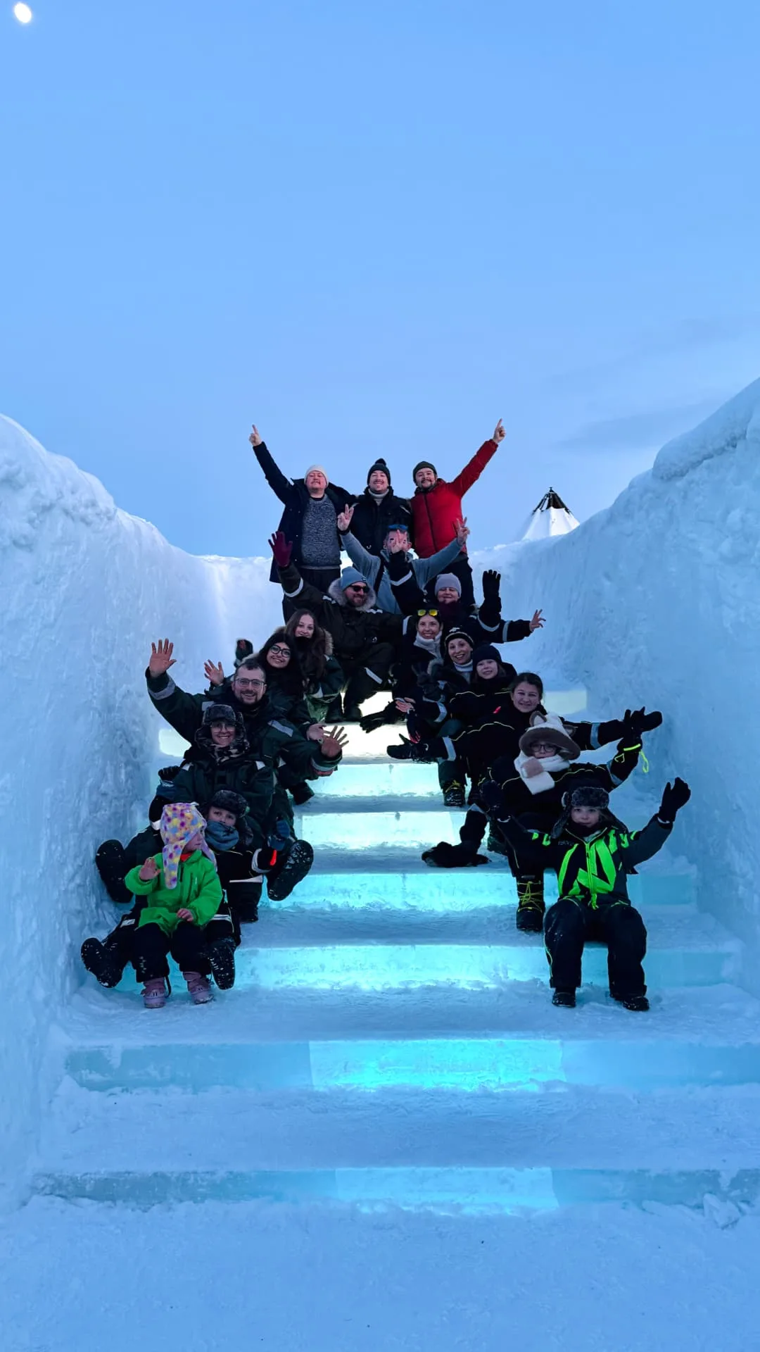 Our guest group on the lit ice staircase at the ICEHOTEL in Jukkasjärvi