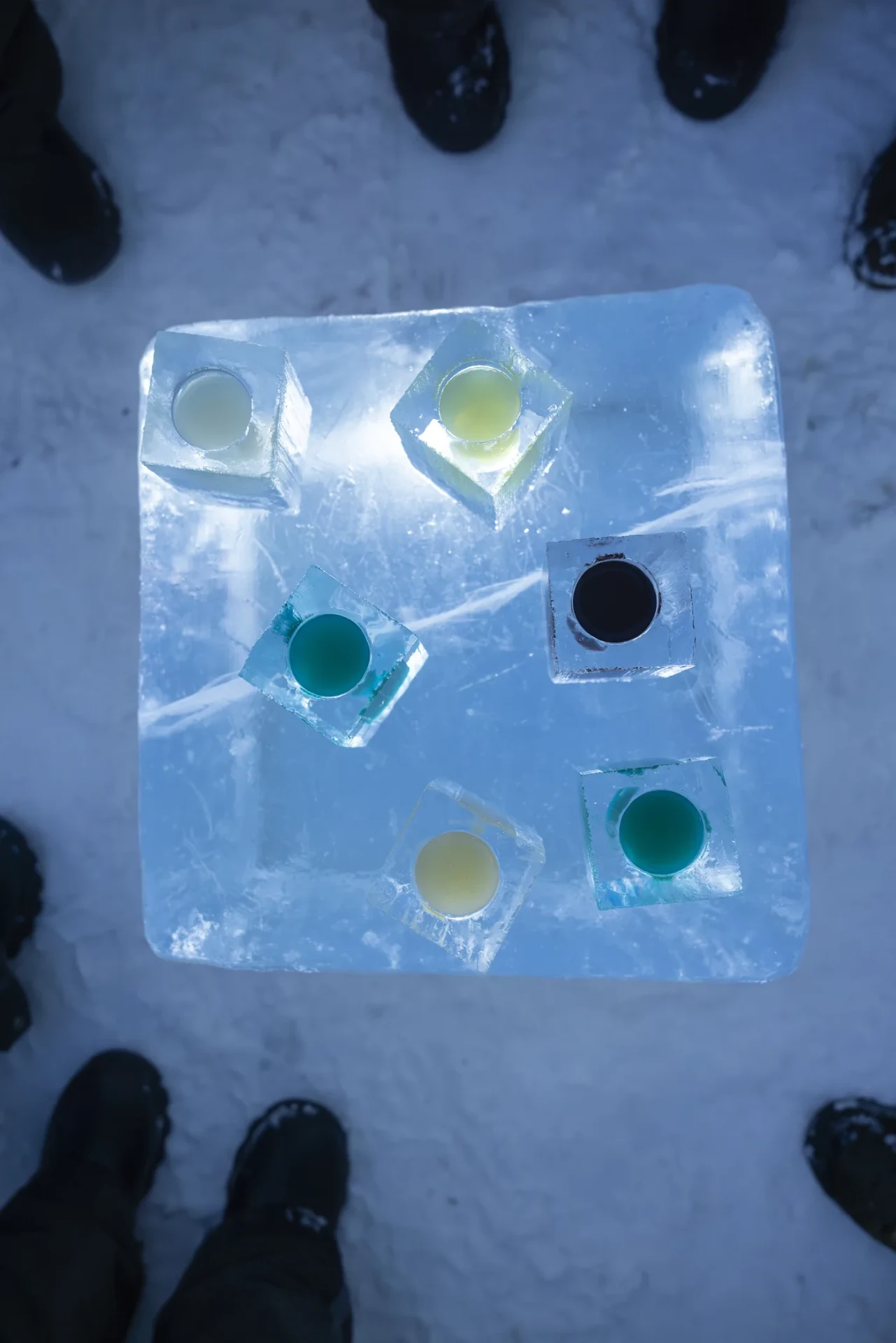 Drinks served in glasses carved from ice at the ICEHOTEL ice bar