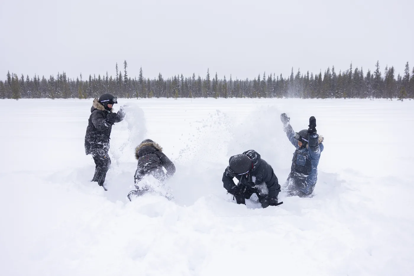 Guests in a snowball fight on the open snowfield