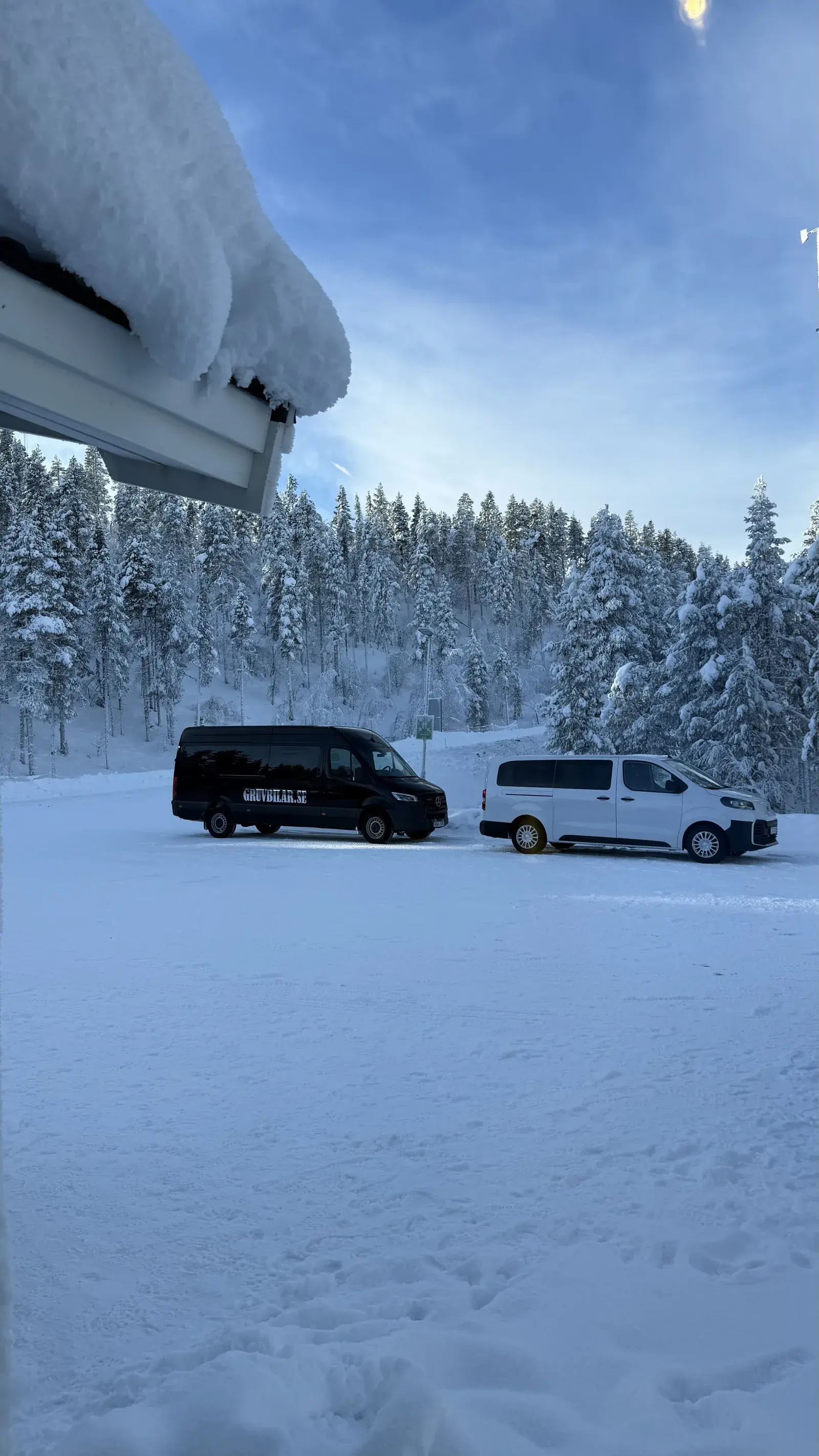 Our winter minibuses parked in the snow, used for every transfer during the week